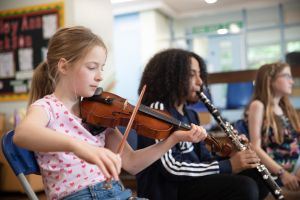 A BMA violinist and clarinettist playing together in rehearsals