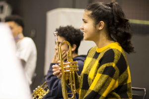 Rehearsing in an ensemble with other young musicians from Brent