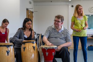 STROKESTRA workshops spreading joy through music