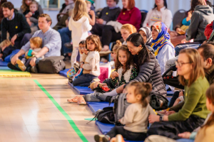 Families enjoying the performance together