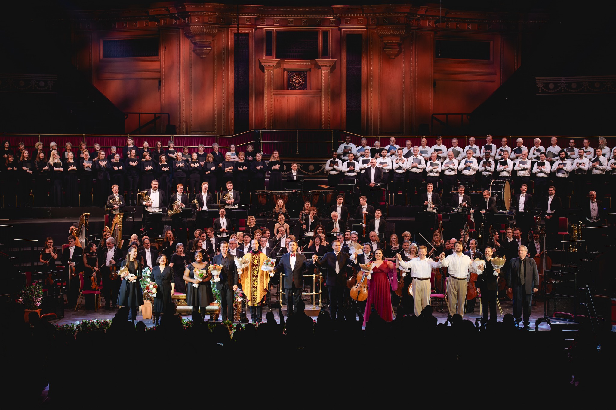 The Iolanta Orchestra, cast and chorus standing to recieve applause