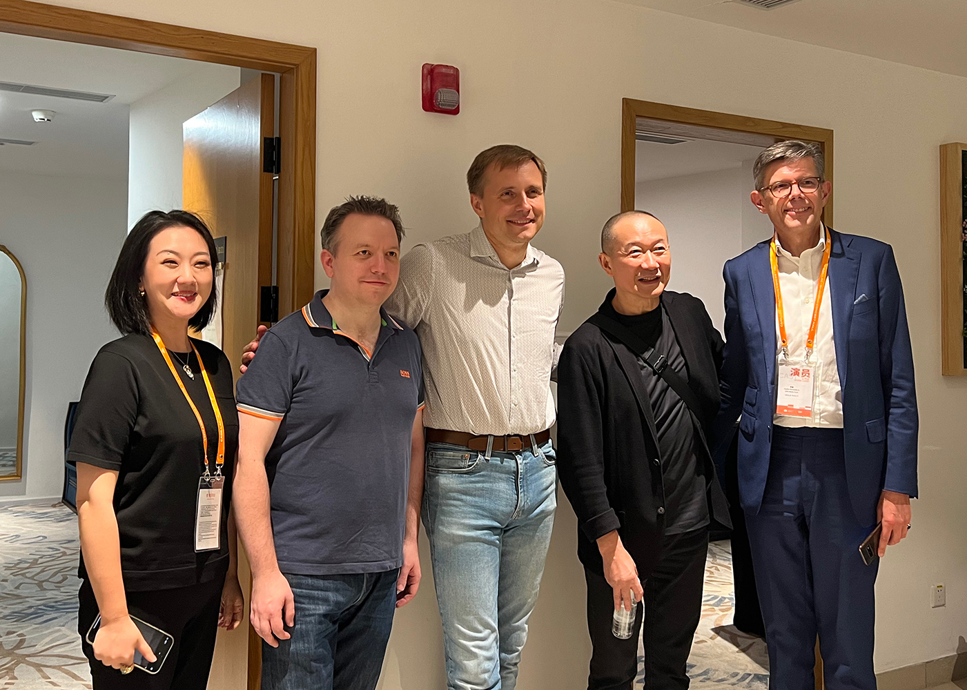 Tan Dun posing with Vasily Petrenko and Richard Harwood