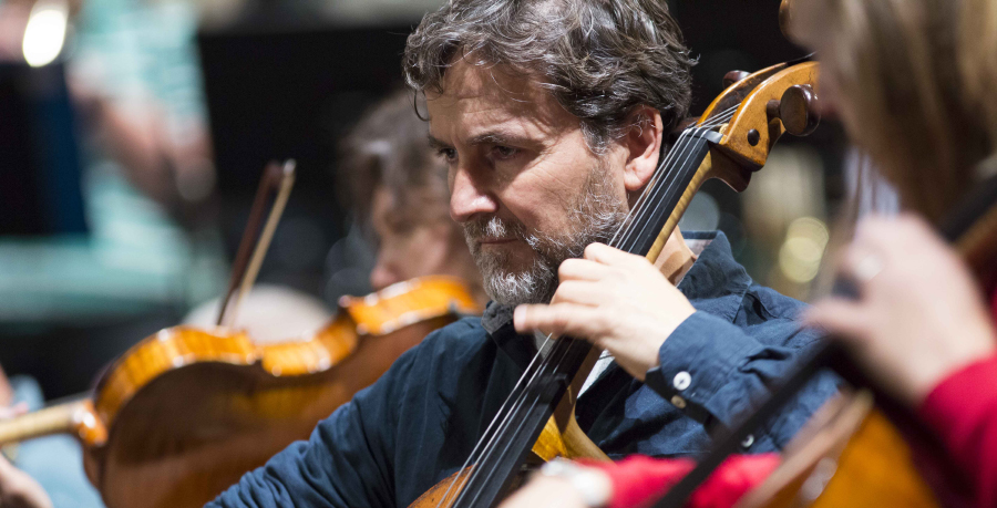 RPO Player Roberto Sorrentino playing the cello in rehearsal.